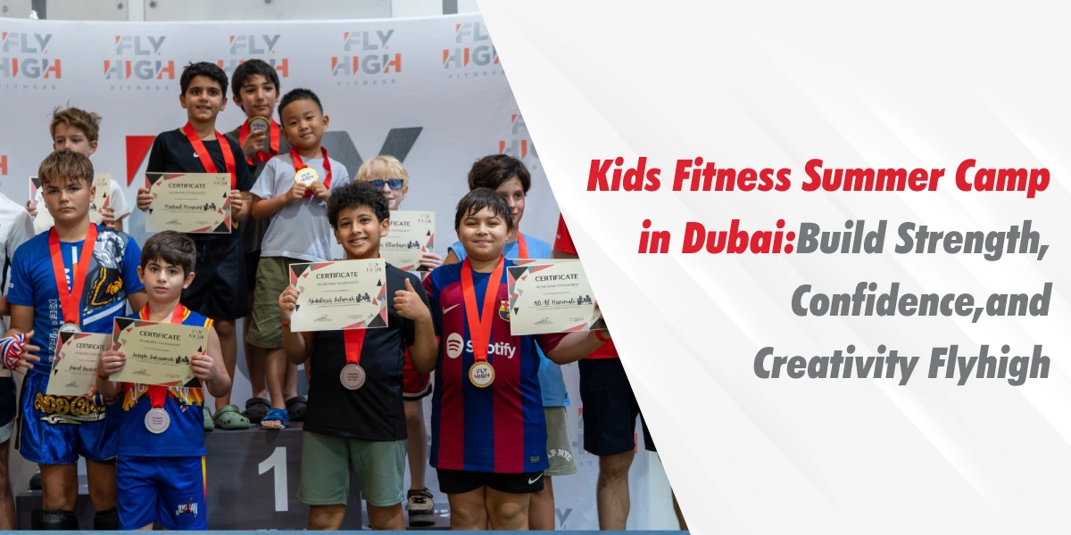 A group of smiling children proudly holding certificates and wearing medals on a podium at the Kids Fitness Summer Camp in Dubai by Fly High Fitness, celebrating their achievements in building strength and confidence.