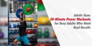 A fit man performing a barbell overhead press at an Adults Gym with a 30-minute power workout headline for busy professionals.